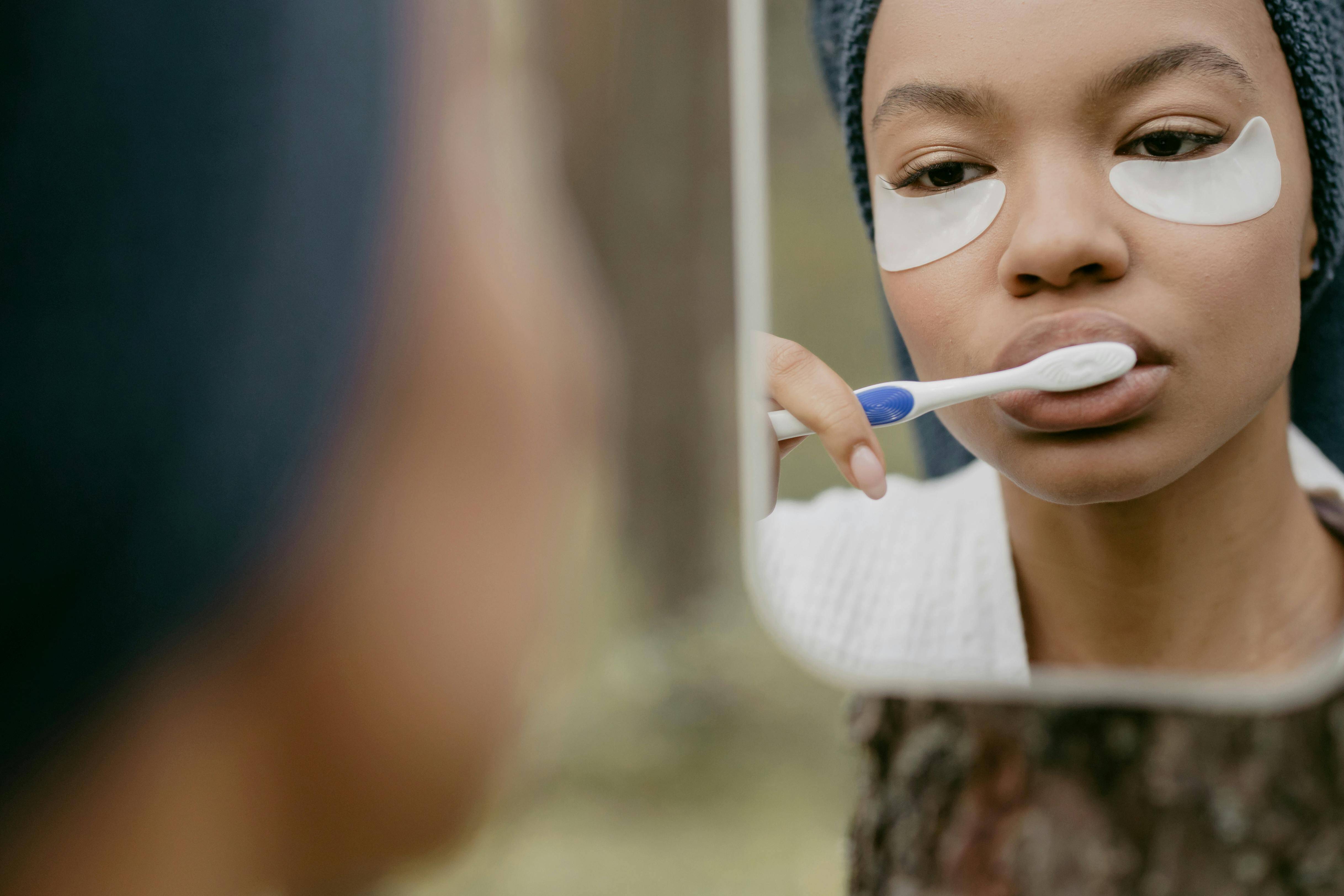 Person brushing teeth