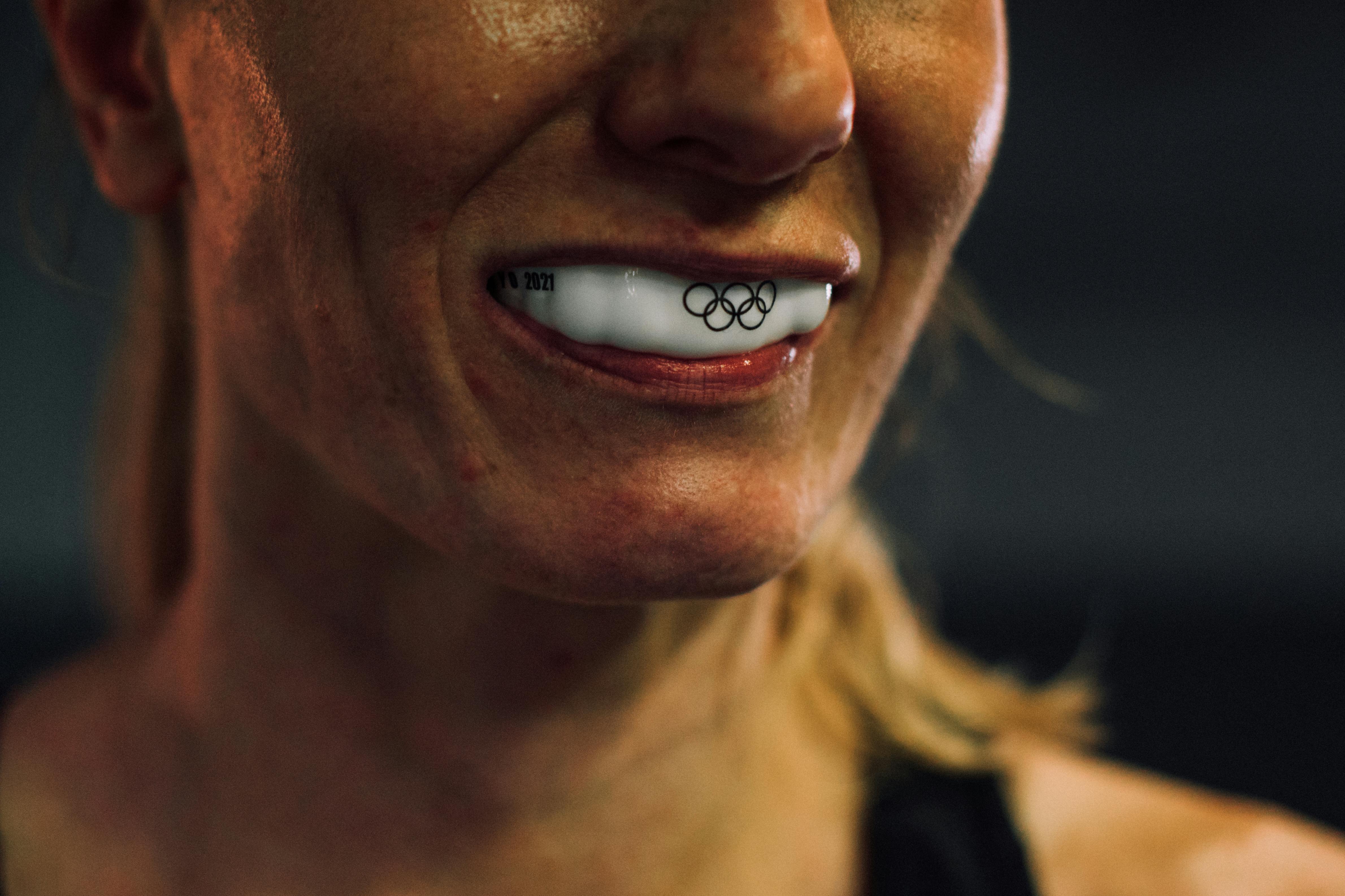 Person wearing a mouthguard