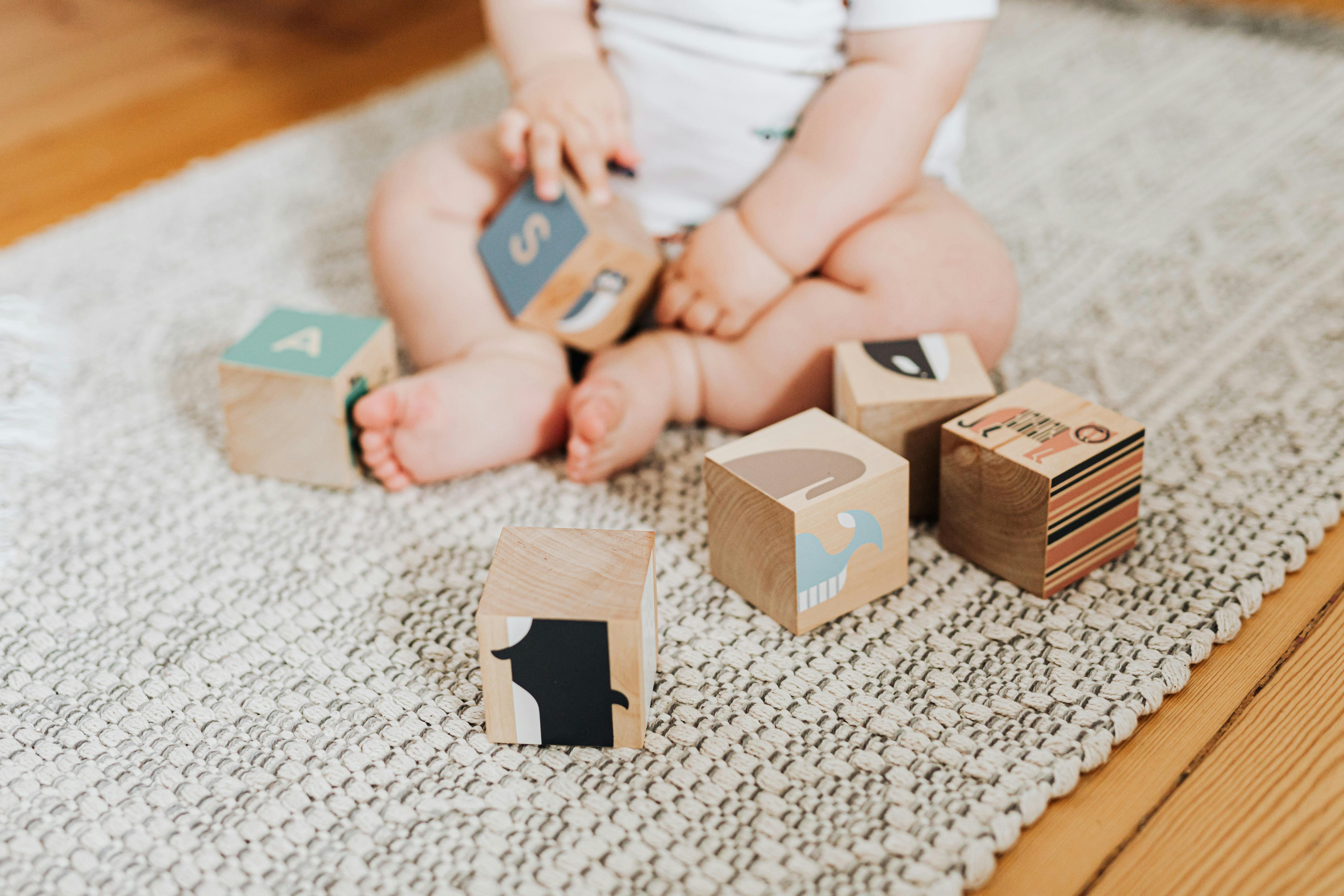 Baby plating with toys